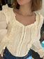 Ruffled Reverie Chic Top