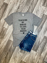 Load image into Gallery viewer, Teaching My Babies To Love Your Babies Tee in Grey
